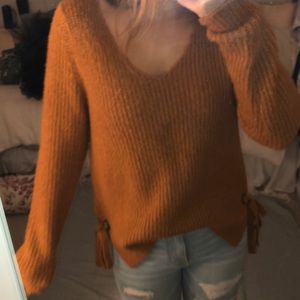 orange sweater perfect for fall